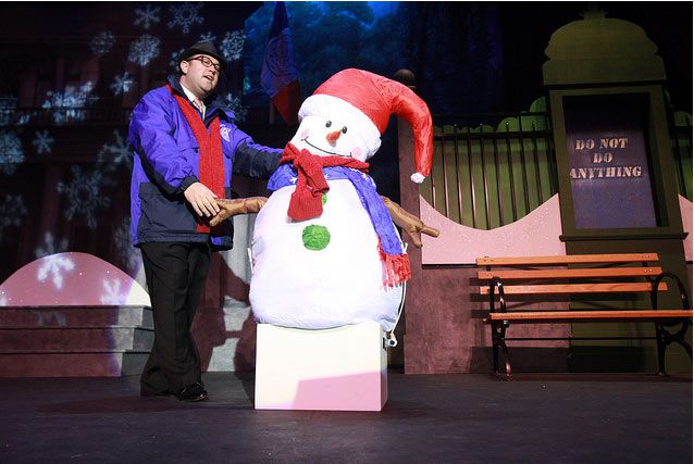 Stu Loeser Makes a snowman.
